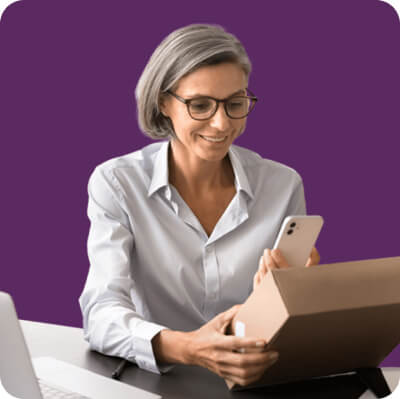 woman scanning a box with her phone