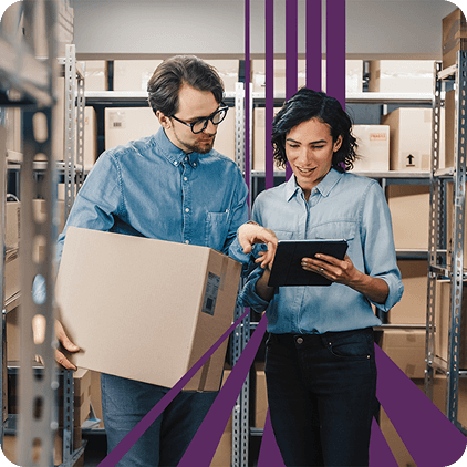 workers looking at tablet device